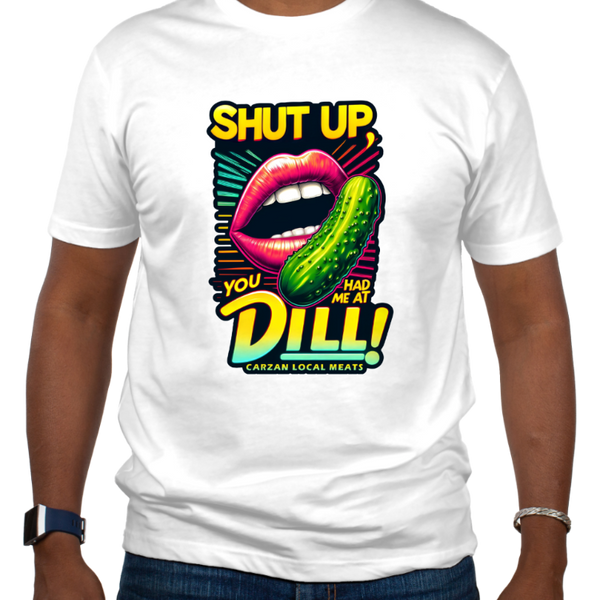 A man wearing a white graphic tee with the text 'SHUT UP YOU HAD ME AT DILL' and a graphic of a pickle, indicating a playful statement about liking pickles.