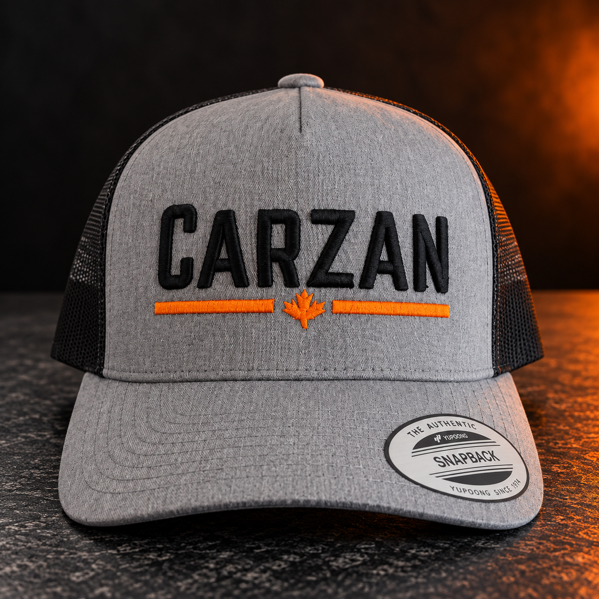 Carzan Trucker Hat in Heather Grey with black mesh, front view with raised black Carzan logo
