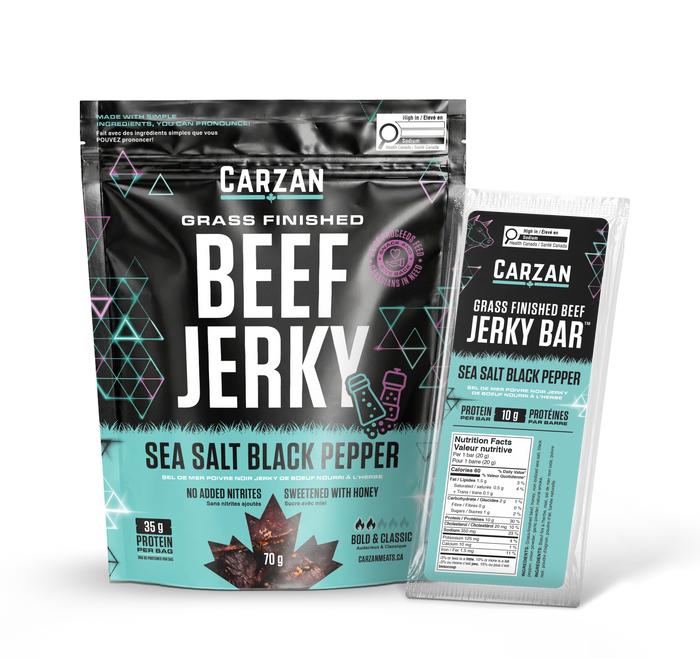 Carzan Grass Finished Beef Jerky bar in Sea Salt Black Pepper flavor, shown as a large stand-up pouch alongside a single wrapped jerky bar on a clean white background.